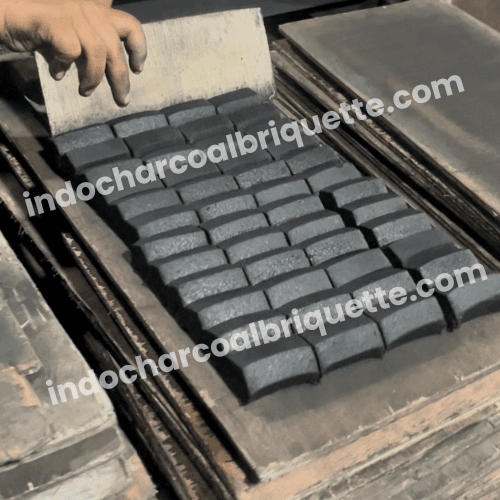 Coconut charcoal briquette production in Java, Indonesia
